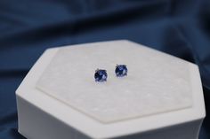 These stunning light blue gemstone stud earrings are reminiscent of the tranquil ocean waters, captivating with their serene and refreshing hue. Delicately crafted, they radiate a graceful and sophisticated charm, making them a beautiful choice for any occasion.