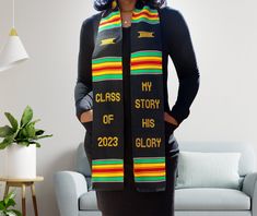 a woman wearing a scarf with the words my class story of his glory on it