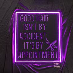 a neon sign that says, good hair isn't by accident it's by appointment