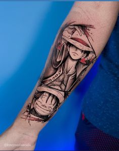 a man's arm with a tattoo on it and an image of a woman wearing a hat