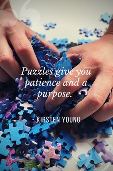 two hands holding puzzle pieces with the words, puzzles give you patience and a purpose