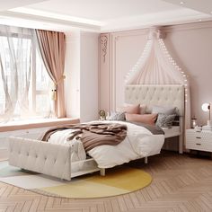 a bedroom with pink walls, white furniture and wooden flooring is pictured in this image