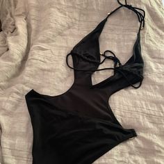 Victoria Secret Brand Swimsuit In Black Size Small Brand New Never Worn Black Triangle Top Bodysuit For Swimming, Black Triangle Top Bodysuit For Vacation, Summer Black Cutout Bodysuit, Black Halter Neck Bodysuit For The Beach, Black Halter Neck Bodysuit For Beach, Black Halter Neck Summer Bodysuit, Black Summer Party Swimwear, Black Cutout Bodysuit For Poolside, Black Beachwear Bodysuit For Beach Season