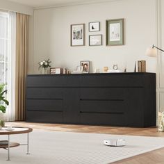 a living room scene with focus on the coffee table and sideboard in the foreground