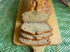 sliced loaf of bread sitting on top of a cutting board