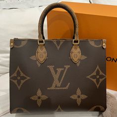 Louis Vuitton On The Go Mm Tote Great Condition Minor Scratch Towards The Bottom Front Inside In Excellent Condition Comes With Original Shopping Bag, Box, And Dust Bag Louis Vuitton On The Go, Bags Louis Vuitton, Louis Vuitton Bags, Womens Tote Bags, Louis Vuitton Bag, The Go, Dust Bag, Louis Vuitton, Quick Saves