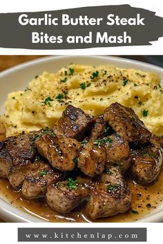 garlic butter steak bites and mash on a plate