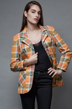 vintage 1970s plaid blazer jacketorange blue plaid printed cottonantiqued gold-tone buttons2 hip pocketsfully lined ----- Measurements (taken flat)Shoulders : 16.5"Bust (flat x 2) : 41"Waist (flat x 2) : 32"Hips (flat x 2) : -Length : 26"Sleeve Length : 22"Tag : Serbin of FloridaPinned on model? : NoNote : will work as M or L, depending on your fit preference. Fabric has no stretch. Gabrielle is 5′7″ tall with 33" bust, 25" waist, and 36" hipsVisit { ShopRabbitHole.com } for even more vintage!Et Fall Orange Blazer With Pockets, Orange Single-breasted Blazer For Fall, Fall Orange Single Breasted Blazer, Plaid Cotton Blazer For Fall, Retro Cotton Blazer With Button Closure, Retro Cotton Blazer For Fall, Vintage Plaid Blazer With Pockets, Vintage Plaid Blazer With Notch Lapel, Vintage Single Breasted Plaid Blazer