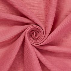 a close up shot of pink fabric