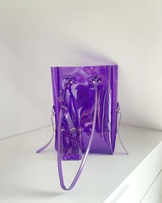 Purple tote bag, shoulder bag, vinyl bag, security handbags, jelly purse, office style, vegan, 90s, y2k, handmade tote, medium bag, custom Made for order in 7 days. Dimensions: 28 x 33 x 6 ( 8 cm top11 x 13 x 2,36 ( 3,15 top) Two pockets inside and one outside. Made of thick, crystalline, flexible PVC, 100 % in my workshop. See my other unusual handbags, which I create with passion and love for things exceptional nature, as these inspire real life . https://www.etsy.com/shop/ypsilonbags ...pleas Modern Purple Rectangular Satchel, Modern Rectangular Purple Satchel, Everyday Shoulder Bag With Clear Strap, Modern Purple Shoulder Bag, Modern Clear Rectangular Shoulder Bag, Trendy Plastic Tote Shoulder Bag, Purple Rectangular Bag With Clear Strap, Rectangular Clear Shoulder Bag For Shopping, Trendy Purple Satchel For Everyday Use