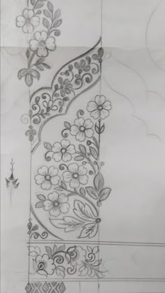 a drawing of flowers and vines on a white paper background with an ornamental design in the middle