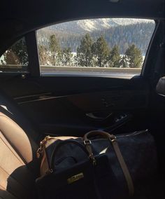 there is a bag in the back seat of a car