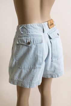 Vintage 1980s Denim Shorts Lizwear Light Blue Wash High Waist Pleat Pleated Mom Jeans 80s Fashion Small 26 Waist - Etsy Retro Light Wash Short Bottoms, Vintage Denim Blue Bottoms For Summer, Vintage Light Wash Short Bottoms, Vintage Cotton Shorts, Vintage High Waist Light Wash Jean Shorts, 1970s Denim Bottoms With Pockets, 1970s Style Denim Bottoms With Pockets, Vintage Light Wash Jean Shorts For Spring, Vintage High Waist Shorts With Pockets