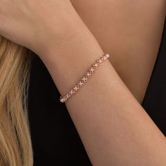 Bright and beautiful, this diamond tennis bracelet is a shining addition to your day or evening attire. Crafted in sterling silver with 14K rose gold plate, this dainty style design features milgrain-edged open circle links centered with squared beaded and sparkling diamond-touched composites. Radiant with 1/4 ct. t.w. of diamonds and a brilliant buffed luster, this charming 7.25-inch tennis bracelet secures with a tongue and groove clasp. Rose Gold Diamond Tennis Bracelet With Prong Setting, Rose Gold Diamond Tennis Bracelet Brilliant Cut, Rose Gold Round Diamond Bracelet Fine Jewelry, Anniversary Rose Gold Tennis Bracelet With Diamond Accents, Anniversary Rose Gold Tennis Bracelet With Brilliant Cut, Rose Gold Diamond Tennis Bracelet With Jubilee Style, Fine Jewelry Rose Gold Tennis Bracelet With Prong Setting, Rose Gold Tennis Bracelet With Prong Setting, Anniversary Fine Jewelry Rose Gold Tennis Bracelet