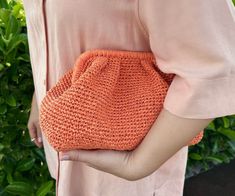 "Introducing our Orange Raffia Pouch Clutch Bag, the ultimate wicker beach clutch and summer bag. Handcrafted with care and attention to detail, this vibrant accessory is perfect for adding a pop of color to your outfit. Whether you're strolling along the beach or enjoying a sunny day in the city, this versatile bag will keep your essentials secure and in style. Made from high-quality raffia, it's lightweight and durable, making it ideal for everyday use. Elevate your summer wardrobe with this trendy and functional clutch bag. Shop now and embrace the sunny vibes with our Orange Raffia Pouch Clutch Bag. ✔️ Suitable for use as hand bag, make-up bag or party bag * Timless and guality handmade crochet product ⚠️ If you want to buy the product in the images, you need to select the color \"BEIG Summer Crochet Clutch Bag With Braided Handles, Summer Travel Clutch, Summer Woven Travel Clutch, Summer Beach Straw Clutch Bag, Summer Travel Clutch Pouch, Summer Travel Pouch Clutch, Summer Handheld Pouch For Daily Use, Summer Woven Beach Clutch, Summer Woven Clutch For Beach