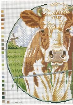 a cross stitch pattern of a brown cow