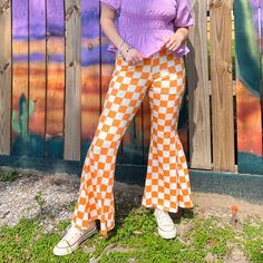 Make These Pants The Star Of Your Outfit!! There Is Truly Nothing Better Than A Pair Of Cute And Comfy Pants!!! These Orange & White Flare Checkered Pants Are Truly That Girl!! Style Them With A Fun Graphic Tee, A Cute Tank Top, Or A Colorful Blouse! You Cannot Go Wrong Pairing These Flares With Yellows, Purples, Blues, And Pinks!! Checkers!!!!! Super Soft Fabric A Fun Flare + They Have Pockets!! Style With Graphic Tees, Tank Tops, And Blouses! Looks Fantastic With Blues, Purples, Pinks, And Yel Purple Pants Outfit, Checkered Outfit, Bae Style, Colorful Blouse, Clothing Finds, Checkered Pants, Colorful Blouses, Orange Pants, White Flares