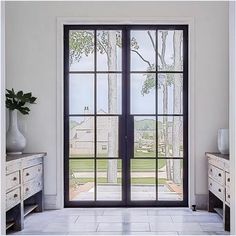 black neat design double iron glass doors with handle and lock French Doors With Transom, Modern Glass House, French Front Doors, French Double Doors, Steel French Doors, Iron Entry Doors, French Exterior, French Doors Exterior, Iron Windows