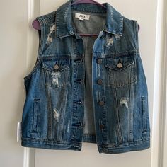 New With Tags Ripped Cotton Denim Vest For Fall, Grunge Denim Vest With Pockets, Fall Distressed Denim Vest, Casual Ripped Dark Wash Denim Vest, Casual Fitted Ripped Denim Vest, Trendy Ripped Denim Vest For Fall, Casual Ripped Denim Vest, Ripped Denim Vest Casual Style, Trendy Ripped Blue Denim Vest