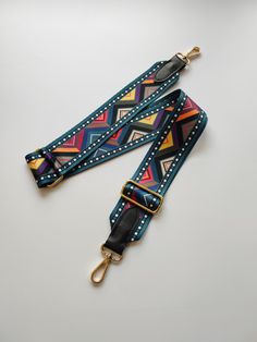 You can use our wide woven removable long bag strap for any bag, camera or phone case you want.  It is a printed polyester woven strap. We offer 3 different sizes: Adjustable : 125 cm  x W 3.8-4 cm Size  1 :  90 cm x W 3.8-4 cm Size  2 :  115 cm x W 3.8-4 cm We offer gold and anthracite colors for the metal accessories. Please message us for your choices. 👜 For more of ValentElle straps / Pour plus de sacs ValentElle : https://www.etsy.com/fr/shop/ValentElle?section_id=41534341 Long Strap Crossbody Bag Strap As Fashion Accessory, Adjustable Multicolor Crossbody Shoulder Strap, Multicolor Crossbody Shoulder Strap For Everyday Use, Trendy Crossbody Bag Strap As Fashion Accessory, Adjustable Logo Strap Crossbody, Trendy Adjustable Crossbody Shoulder Strap, Logo Strap Crossbody Bag Strap For Daily Use, Adjustable Logo Crossbody Shoulder Strap, Daily Use Crossbody Bag Strap With Logo