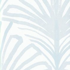 a blue and white wallpaper with palm leaves on it's back drop down