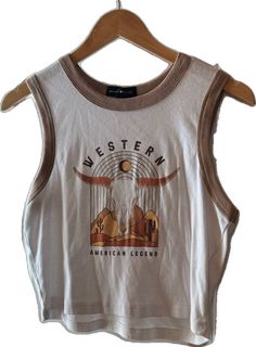 Trendy Sleeveless Brown Top, Casual Graphic Print Cami Tank Top, Casual Brown Sleeveless Crop Top, Brown Casual Sleeveless Tank Top, Brown Crew Neck Tank Top For Summer, Casual Brown Sleeveless Tank Top, Summer Brown Crew Neck Tank Top, Trendy Brown Cotton Tank Top, Brown Vest Top For Summer