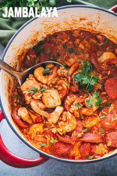 a large pot filled with meat and vegetables