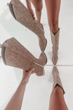 Similar to our BESTSELLING Put The Sparkle In The Party Western Boots, we give you...Shoes That Shine Rhinestone Western Boots!!! Same sparkle, but a little bit taller!! Yes, count us in!! Rhinestone pointed toe western boot, half zipper closure on the inside, heel is a wooden stacked heel Runs true to size Heel height is 3” Rodeo Outfits With Sparkly Boots, Bedazzled Cowgirl Boots, Sequin Cowboy Boots Outfit, Boots And Bling Gala Outfit, Bling Boots Outfit, Boots And Bling Party Outfit Classy, Sparkle Cowboy Boots Outfit, Rhinestone Cowboy Boots Outfit, Sparkly Cowgirl Boots Outfit