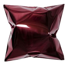 an image of a shiny red pillow on a white background in the shape of a star