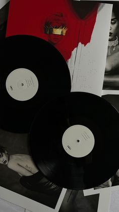 two black records sitting on top of each other