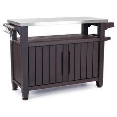 the outdoor bar is made from wood and has an ice chest on one side with two doors