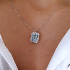 Aquamarine and Diamond pendant necklace in 18k white gold. Solid gold necklace with natural emerald cut aquamarine. Very bright aquamarine, the stone is very clean and without inclusions. Jewel of excellent quality and great elegance. The chain used is a rolò with a "diamond" finish, this finish creates light effects that make the necklace even more brilliant! You can choose the length of the chain. Our customers usually choose a length between 42 and 48 cm. Write us if you want to change the st Luxury Aquamarine Fine Jewelry Necklace, Aquamarine Necklace Pendant, Gem Engagement Rings, Aquamarine Pendant, Aquamarine Necklace, Solid Gold Necklace, Aquamarine Jewelry, Diamond Pendant Necklace, Natural Emerald