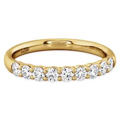 Nine strikingly stunning diamonds stand together to create this Hearts On Fire signature band.- 18K YELLOW GOLD.- DIAMOND WEIGHT: 0.47 CTW.- DIAMOND QUALITY: GH (NEAR COLORLESS) VS (VERY SLIGHTLY INCLUDED).- FINGER SIZE: 6.5.- Also available in Platinum, White or Rose Gold.- Can be ordered in most finger sizes.- Price may vary by finger size and metal fluctuations.- **One Year Manufacturer's Warranty**. Hearts On Fire, Fire Heart, Diamond Band, On Fire, Diamond Bands, Or Rose, Gold Diamond, Platinum, Diamonds