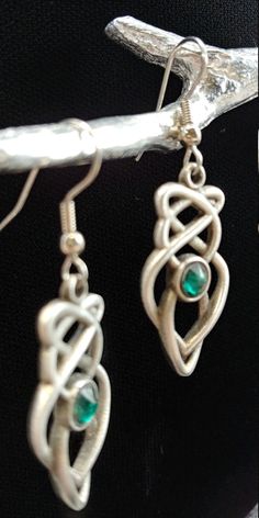 "Hand cast and hand finished out of lead-free Britannia Pewter. This pair of Celtic Knot earrings measures 1 1\\/4\" x 5\\/8\" and the earring post is surgical steel. Matching necklace is also available. I have more than one item in stock, if you require more, please contact me. History of Celtic Knots Celtic knots or Celtic interlace are ornamental patterns that first became associated with Celtic people in the early Celtic Church where they were used to decorate Bible. Monks used the Celtic kn Decorate Bible, Celtic People, Celtic Ornaments, Celtic Knot Earrings, Celtic Knot Designs, Book Of Kells, Celtic Knots, Earring Post, Knot Earrings