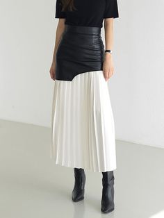 Tami Pleated Skirt with Faux Leather Patchwork - 2 Colors. Truly gorgeous and stylish skirt with a layered look of faux leather ini skirt patchwork upper over a pleated skirt. This midi to Max ankle length A-line pleated skirt is elegant with a cool geometric upper hemline that are body flattering and high fashion. Gender: WOMENItem Type: SkirtSilhouette: PleatedPattern Type: PatchworkMaterial: Cotton, Polyester, PU LeatherFabric Type: WovenDresses Length: Mid-CalfWaistline: Empire SIZE CHART Si Leather A Line Skirt, Pu Skirt, Pleats Pattern, Black And White Outfit, Skirt Tulle, Stylish Skirts, Patchwork Skirt, Skirts Midi High Waisted, Chiffon Fashion