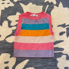 In Great Condition. Never Worn. Super Pretty & Vibrant Colors! Multicolor Fitted Retro Tank Top, Trendy Multicolor Crew Neck Crop Top, Spring Multicolor Crew Neck Crop Top, Trendy Rainbow Sleeveless Top, Multicolor Crew Neck Crop Top For Summer, Summer Pink Tops With Rainbow Print, Pink Rainbow Print Top For Summer, Casual Rainbow Sleeveless Top, Multicolor Color Block Tops For Spring