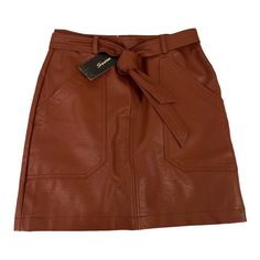 Brown Leather Skirt Brown Mini Skirt With Belt Loops, Trendy Brown Mini Skirt For Work, Brown Belted Mini Skirt, Brown Mini Skirt For Spring Workwear, Spring Brown Skirt With Belt Loops, Brown Skirt With Belt Loops For Spring, Chic Brown Pencil Mini Skirt, High-waist Brown Mini Skirt, Trendy Brown Workwear Skirt