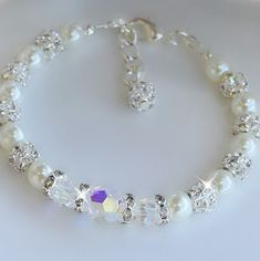 Bracelet is made with 6mm crystals, 8mm crystal, crystal beads, crystal spacers and white pearls Perfect for weddings Diy Pearl Hair Accessories, Trendy Jewelry Ideas, Diy Pearl Jewelry, Beaded Hearts, Pearl Hair Accessories, Crystal Anklet, White Pearl Bracelet, Diy Jewelry Unique, Accessories Boho