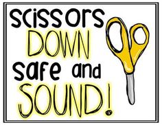 scissors down, safe and sound sign on white background with yellow lettering that reads scissors down, safe and sound