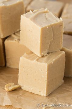 four pieces of brown fudge sitting on top of a white countertop next to each other