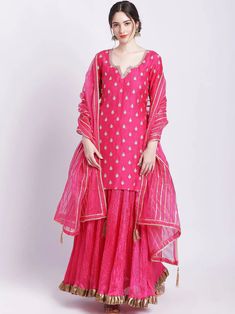 Be the centre of attention in our magenta silk kurta set with net dupatta. Crafted with luxurious silk and accompanied with a delicate net dupatta, this ensemble is the perfect pairing for summer nights and winter weddings. A timeless addition to your wardrobe, make any night special with this exquisite set. No. of pieces - 3 piece set. Fabric - Silk and Net. Color - Magenta. Kurta Length - 42 inches. Washing Instructions - Dry Clean. Silk Kurta Set, Color Magenta, Silk Kurta, Love Couple Photo, Winter Weddings, Net Fabric, Net Dupatta, Couple Photo, Fabric Silk