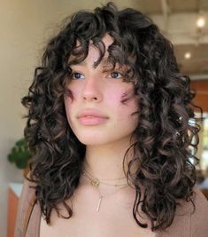 14. Soft Wolfish Face Frame Haircut. Not all wolf haircuts are created with wild layers, and you can opt for a softer version with wispy bangs in the center and graduated edges that blend into side bits. #curlyhairstyleideas Layered Curly Haircuts, Bob Haircut Curly, Dirty Blonde Hair, Curly Hair With Bangs