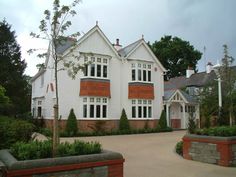 a large white house with lots of windows