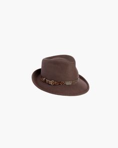 This water-repellent wool-felt fedora is perfect for those who don't want too many hats. The abbreviated brim looks snappy and is reminiscent of mannish hats from the 1950s. This wardrobe staple has an adjustable band of embossed calf leather with antique hardware. The Crown is lined. The elasticized inner band fits most. Imported. Brim Span: 2.5" Art Costume, Band Fits, Felt Fedora, Women's Headwear, Antique Hardware, Costume Institute, Fedora Hat, Vanity Fair, Leather Accessories