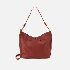 This bag pairs style and function effortlessly, converting from a shoulder bag to crossbody for two looks in one. Pier Shoulder Bag In Pebbled Leather  Rust SHOULDER in Rust | Hobo® Textured Leather Hobo Shoulder Bag For Daily Use, Daily Use Textured Leather Hobo Shoulder Bag, Textured Leather Shoulder Bucket Bag For On-the-go, Textured Leather Bucket Bag For On-the-go, On-the-go Soft Leather Crossbody Shoulder Bag, Versatile Hobo Bag With Detachable Strap For Errands, Everyday Soft Leather Crossbody Shoulder Bag, Modern Textured Leather Bags For On-the-go, Everyday Textured Leather Tote Hobo Bag