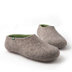 Wool clogs for men, Felted wool slippers made from mountain sheep wool on the outside and soft olive green merino in the interior. An ecological pair of Wooppers house slippers warm cosy and comfortable. Felt clogs which are insulating, breathable and dirt repellent is the best gift for men. SIZES WE NEED TO KNOW YOUR SIZE WITH YOUR ORDER. We make all sizes from men's EU 40 - UK 6 - US 7 up to EU 46 - UK 11 - US 12. Do not order bigger size than your normal moccasins. Ideally drop us a note with Wool Clogs, Felted Wool Slippers, Man Of The House, Warm Slippers, Wool Slippers, Felted Slippers, Wet Felt, Best Gifts For Men, Green Wool