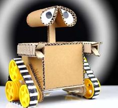 a cardboard robot made to look like it is moving