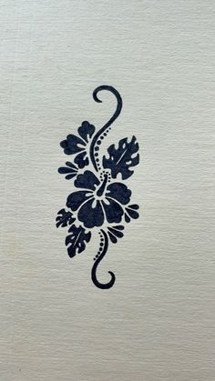 an image of a flower design on a piece of paper that is white and blue