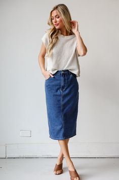 Everyone will admire your chic aesthetic when you arrive in the Uniquely Trendsetting Denim Midi Skirt! This wardrobe essential is designed to elevate your casual style with a touch of laid-back sophistication. Crafted from high-quality denim, the medium wash lends a versatile and enduring charm to the skirt. The midi length adds a modern twist, striking the perfect balance between casual and refined. The denim fabric ensures durability while providing a comfortable fit that molds to your silhou Chic Dark Wash Denim Skirt With Pockets, Casual Medium Wash Denim Midi Skirt, Casual High Waist Relaxed Pencil Skirt, Casual High-rise Pencil Skirt For Spring, Casual High Waist Cotton Pencil Skirt, Casual High Rise Pencil Skirt For Spring, Chic Dark Wash Denim Skirt For Spring, Casual Medium Wash Midi Skirt, Casual Denim Skirt For Day Out