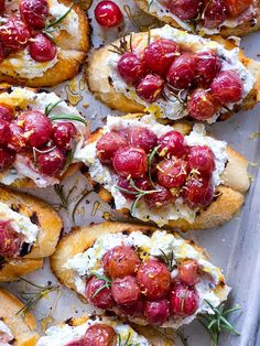 small cranberry and goat cheese appetizers with rosemary sprigs on top